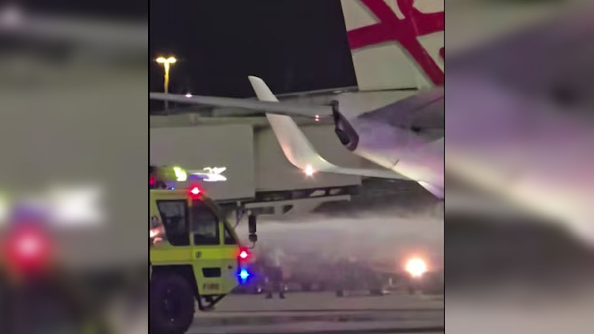Firefighters extinguish brake fire on Virgin Australia plane after landing at Brisbane Airport
